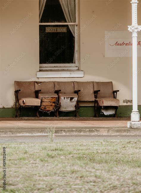 Old vintage theatre seats outside a building. Stock Photo | Adobe Stock