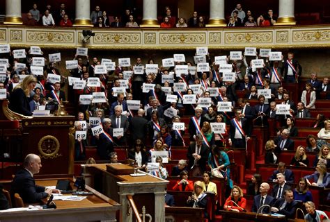 Protesters Set Rubbish On Fire As French Govt Barely Survives No