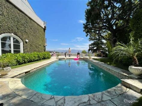 Hollywood Pool in Mansion with Views | Rent this location on Giggster