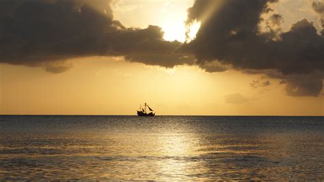 Fish Boat On Body Of Water During Sunset HD Wallpaper Wallpaper Flare