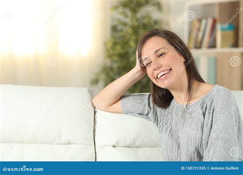 Pensive Woman Laughing Looking Away At Home Stock Image Image Of Copy