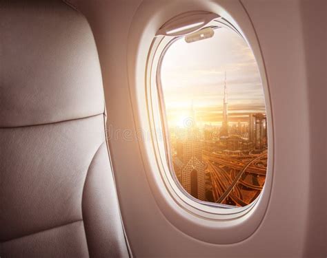 Airplane Interior with Window View of Dubai City Stock Photo - Image of ...