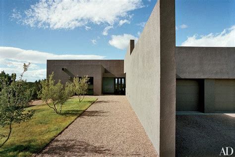 A Gravel Walkway Leads To The Entrance Of Art Director Charles