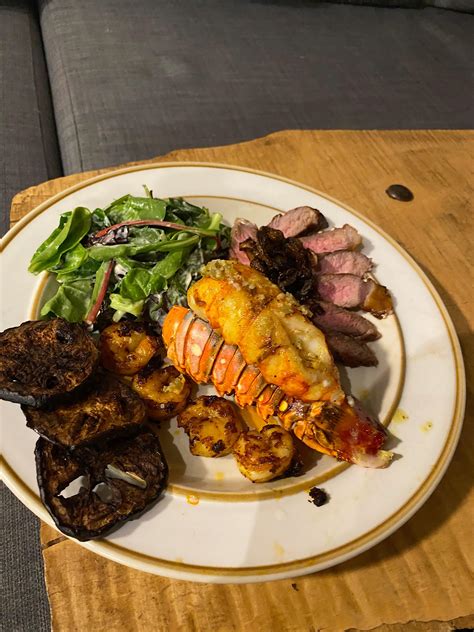 Homemade Surf And Turf Strip Loin Broiled Lobster And Fried Shrimp With Eggplant Chips And