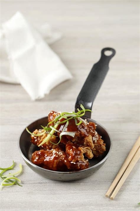 Korean Fried Chicken Yangnyeom Tongdak With Spicy Sauce And Sesame Seed