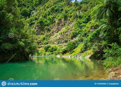 Calm Green Waters Of Mountain River Flowing Along A Forested Cliffs ...