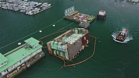 Industrial Cargo Ship Sinking In Aberdeen Hong Kong Aerial Drone View