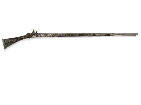 An Ottoman Silver Mounted Flintlock Rifle Signed Ahmed Algeria Dated