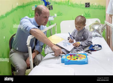 The Duke Of Cambridge With Cancer Patient Muhammed Sameer Five During