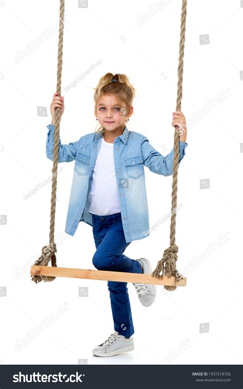 Lovely Blonde Girl Swinging On Rope Stock Photo Edit Now 1937218756