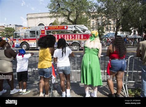 Spectators along Eastern Parkway at the annual West Indian Caribbean ...