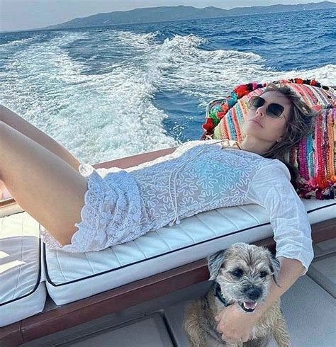 Elizabeth Hurley Lounges By The Water In A Teal Bikini And Sheer Lace HELLO