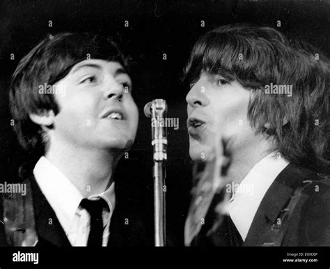 The Beatles Paul McCartney and George Harrison at a concert at Shea ...