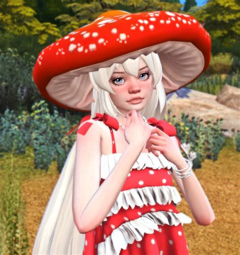 A Woman In A Red And White Dress Standing Next To A Mushroom