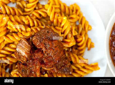 Fusilli Pasta With Neapolitan Style Ragu Meat Sauce Stock Photo Alamy