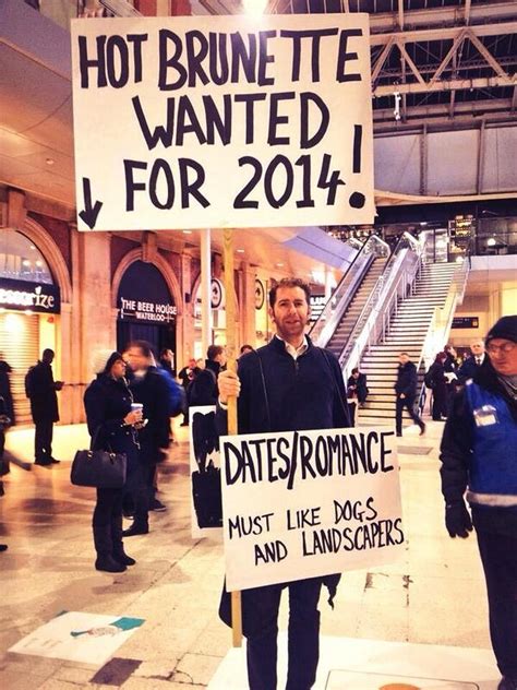 This Man Is Attempting To Pick Up A Hot Brunette With A Picket Sign