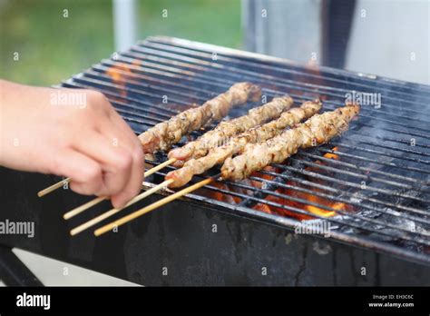 Grilling Satay On BBQ Stock Photo Alamy