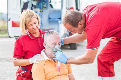 Rescue Team Providing First Aid Stock Photo By William