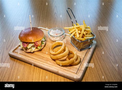 British Pub Food A Serving Of Beef Bacon Cheese And Salad Burger