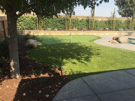 Visalia Pools With Putting Green Fire Pit And Pcc Backyard Pools