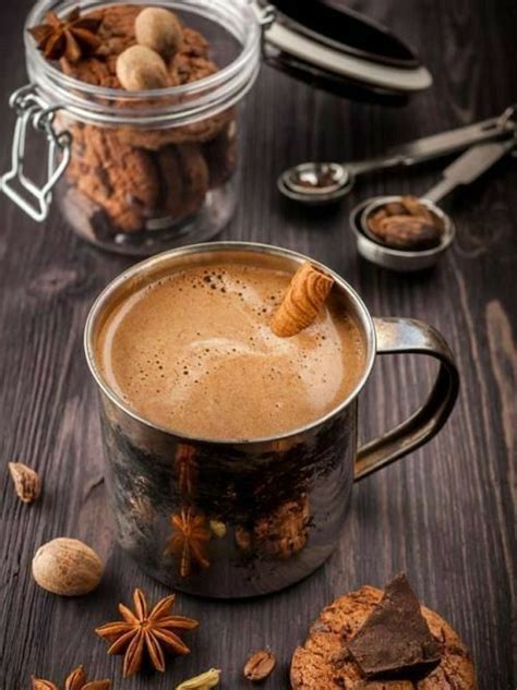 A Cup Of Hot Chocolate With Cinnamon And Star Anise