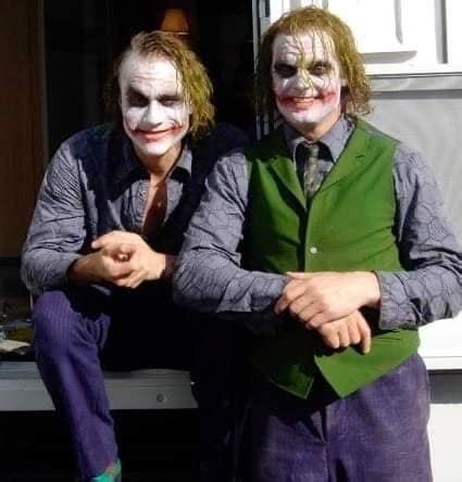 Heath Ledger and his stunt double on the set of The Dark Knight : batman