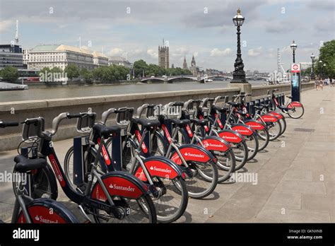 Santander hire bikes at docking station on the Albert Embankment, London, England, UK Stock ...