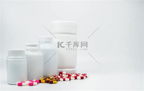 抗生素胶囊药丸和带空白标签的塑料瓶是高清摄影大图 千库网