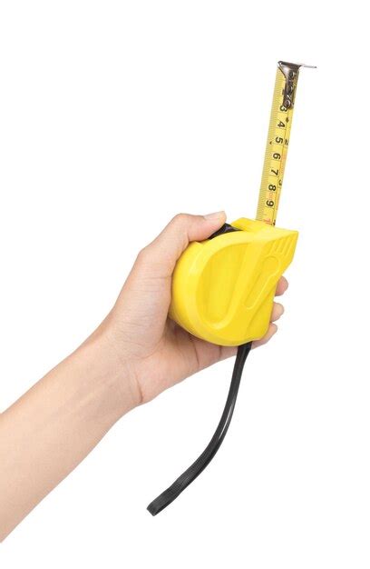 Premium Photo Hand Holding Yellow Tape Measure Isolated On White