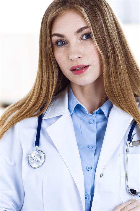 Premium Photo | Woman doctor standing in hospital office. physician at