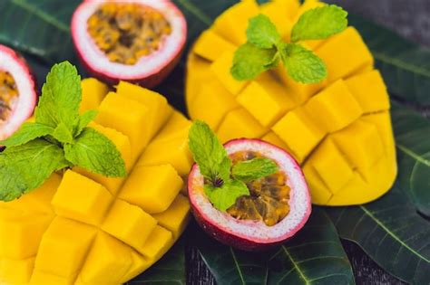 Premium Photo Mango And Passion Fruit On An Old Wooden Table