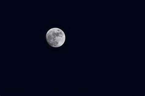 Premium Photo Full Moon Over Dark Black Sky At Night