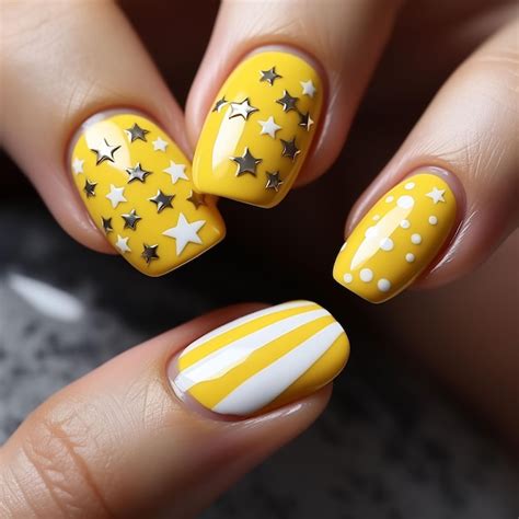 Premium AI Image | a woman with a yellow and white nail art design with stars on the nails