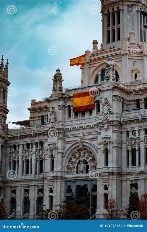 Vertical Shot Of Madrid Capital Building With The Spanish Flag In Spain