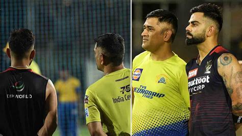 Virat Kohli And Ms Dhoni Hug During A Practice Session Ahead Of The Ipl