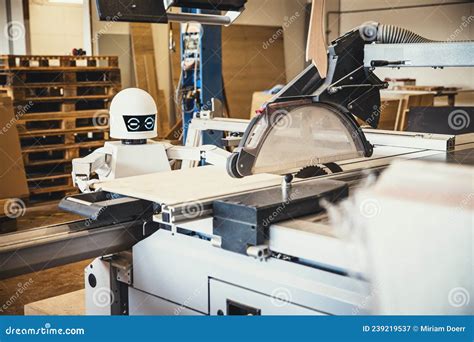 A Robot Works Fully Automatically In A Carpentry Workshop Stock Image