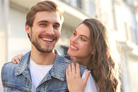 Beautiful Young Couple In Love Walking Outdoors At The City Street Hugging Stock Image Image