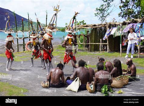 Masked Dancers performing in Front of Seated Musicians at a Mask ...