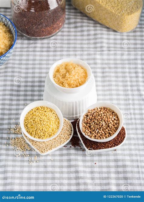 Gluten Free Grains in Bowls on Kitchen Table Stock Photo - Image of