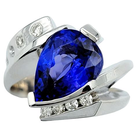 Pear Cut Tanzanite and Diamond Bypass Style Ring Set in 14 Karat White