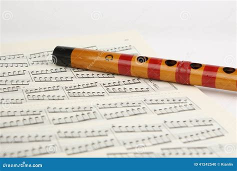 Bamboo Flute and Music Sheet Stock Photo - Image of tone, musical: 41242540