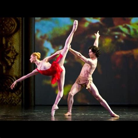 Two Ballet Dancers In Red Tutus And Leotards