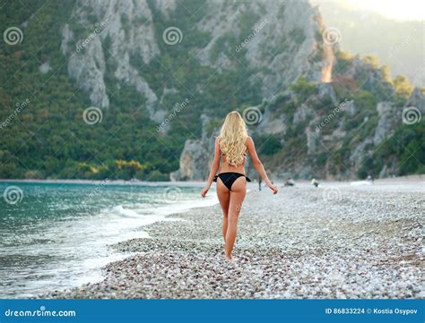 Woman In Bikini Walking Away On Summer Sea Beach Stock Photo Image Of