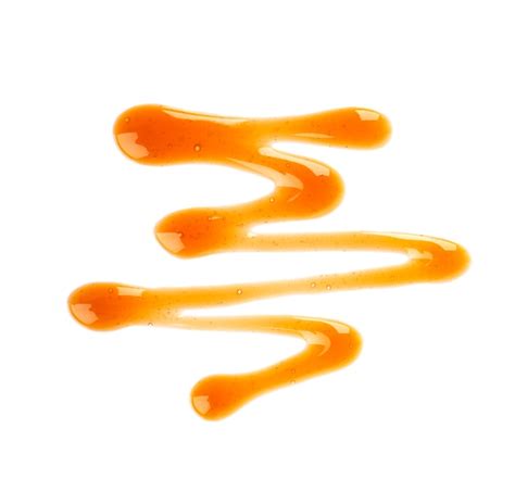 Caramel Syrup Drizzle Isolated On White Splashes Of Sweet Caramel