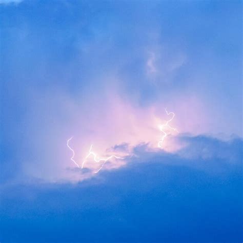 Premium Photo | Lightnings in storm clouds Peals of a thunder and the ...