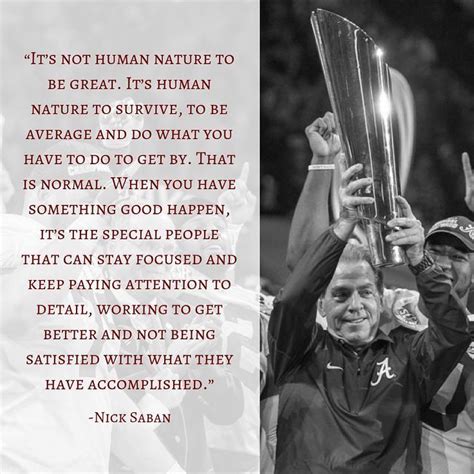 Two Men Holding Up A Trophy With The Words It S Not Human Nature To Be