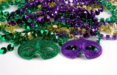 Mardi Gras Beads with Masks Stock Photo - Image of gold, masks: 49156546