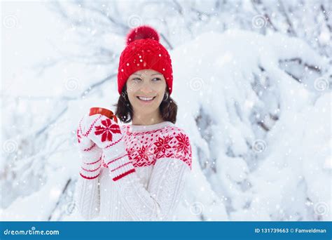 Woman Drinking Hot Chocolate In Christmas Morning In Snowy Garden Girl In Knitted Nordic