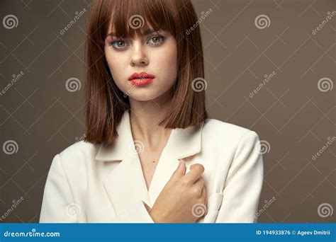 Brunette In Dress Pose For The Camera Stock Photo Image Of Hair Blonde 194933876