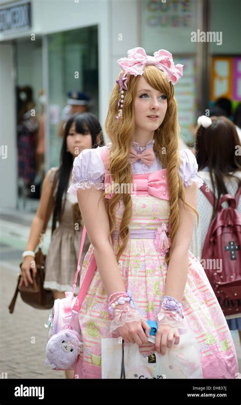 Girl in kawaii gothic clothes; lolita clothing; pretty pink Stock Photo ...